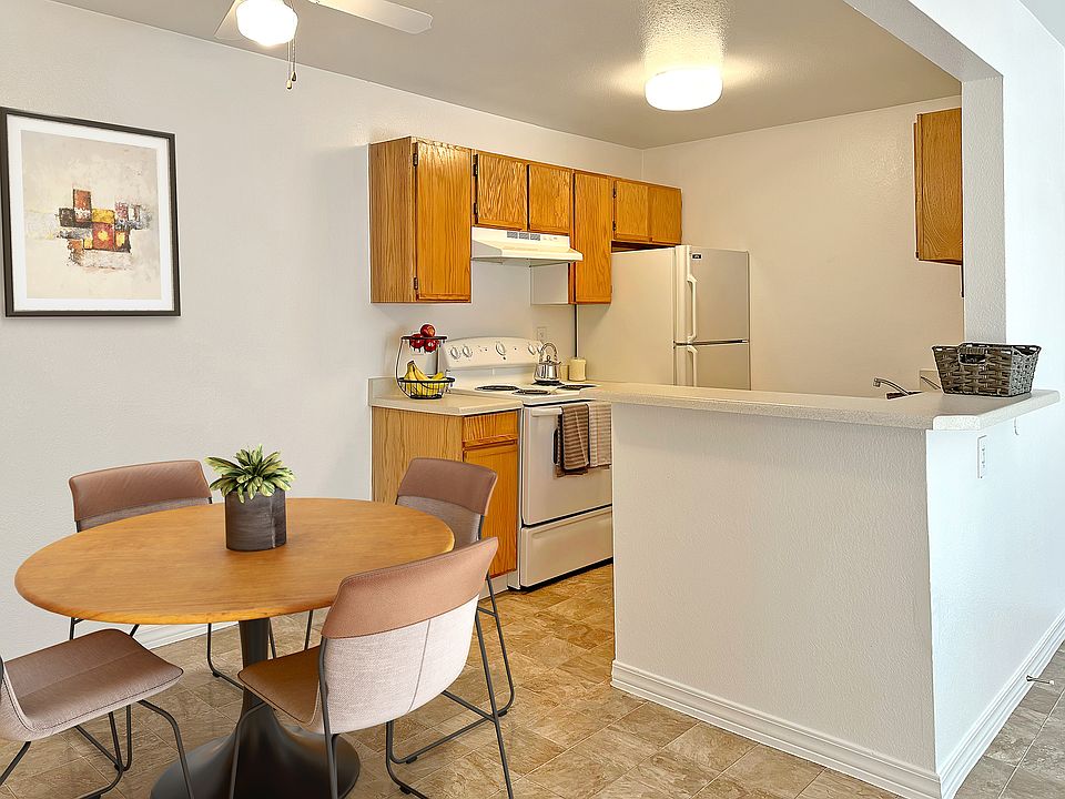 Bridgeside Landing Apartments in Taylorsville, Utah, Kitchen and dining area.