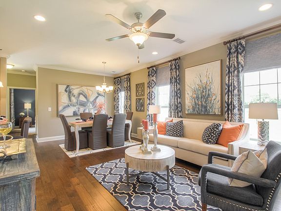 The Raleigh WE Great Room Area This is a model representation, not the actual home