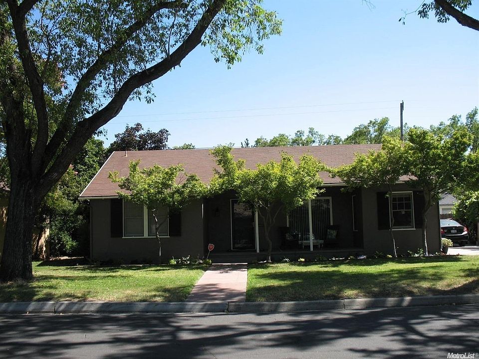 John Muir Park area 3 bedroom, 2 bath home with detached garage on a beautiful tree-lined street featuring an updated kitchen and bathrooms, attractive landscaping and credit for a new roof in escrow....the charming porch offers a great spot to relax and 