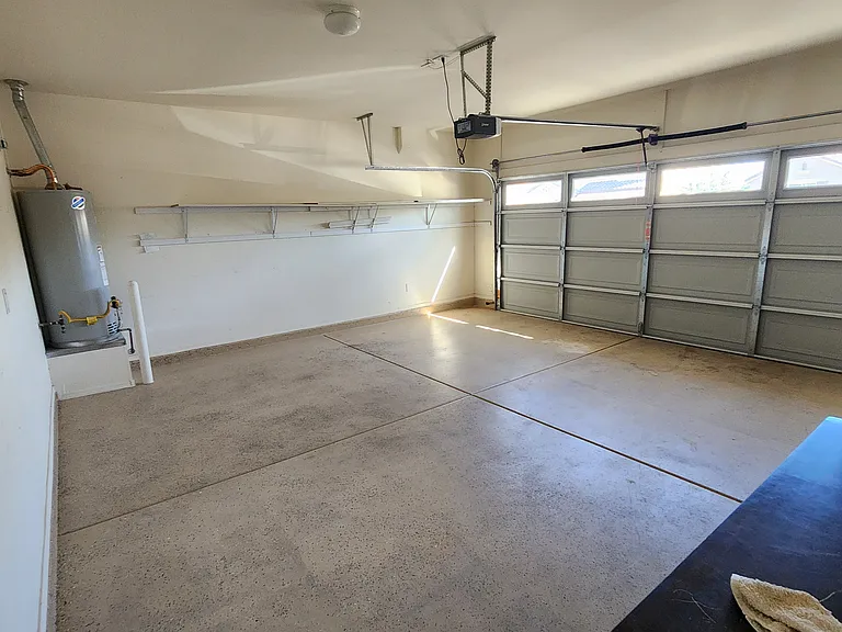 2 car garage with shelving