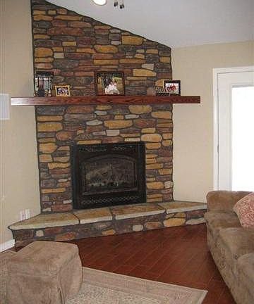 Beautiful fireplace in the corner of Living area