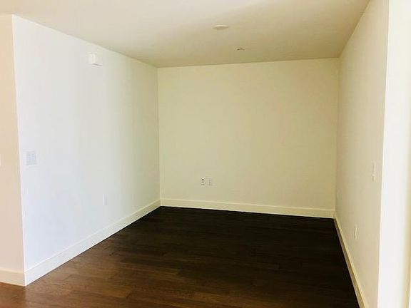Dining room is off of the kitchen and could be used as an office or den.