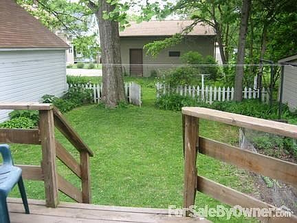 View from the deck
						:
						The lot goes back to the neighbor's garage.