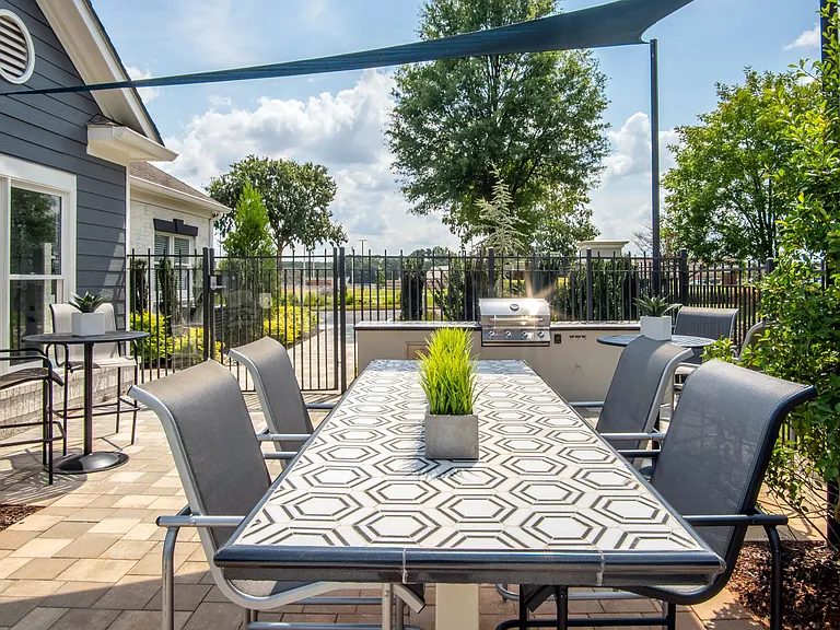 Experience alfresco dining and unforgettable gatherings at our poolside outdoor kitchen!
