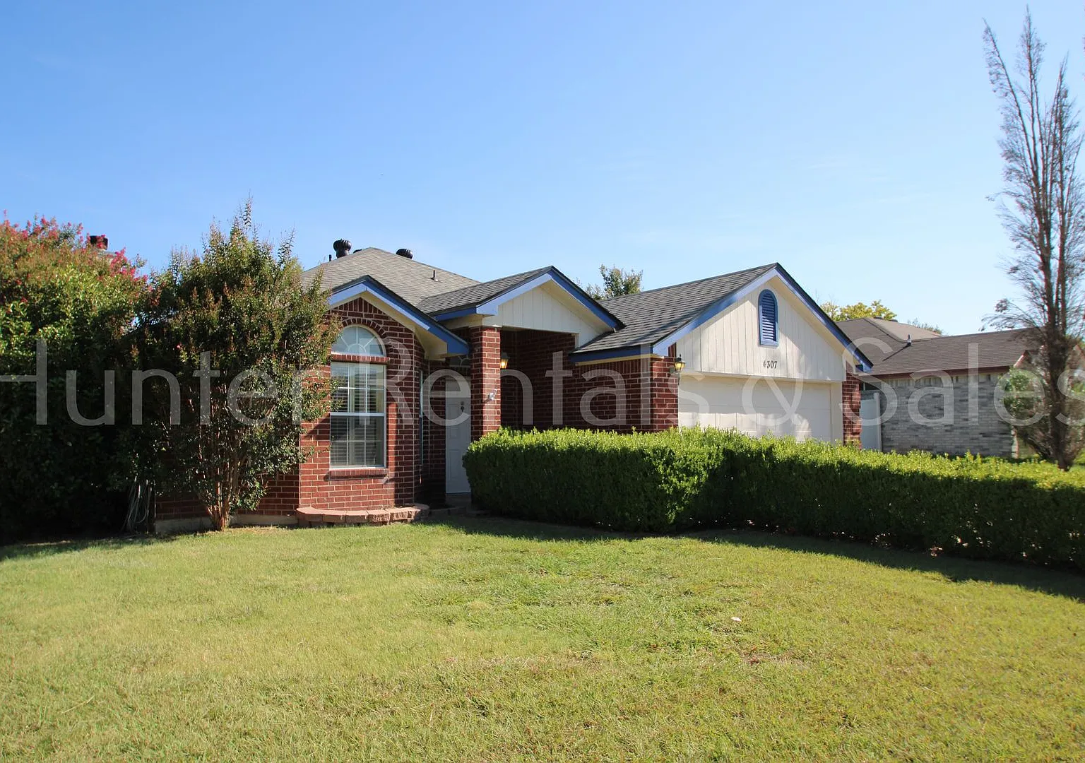 Exceptional Living with Vaulted Ceilings, Cozy Fireplace & Expansive Outdoor Space — Photo 2