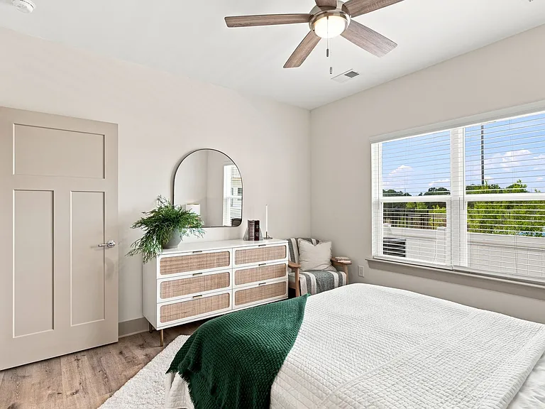 Natural Light Fills This Spacious Bedroom.
