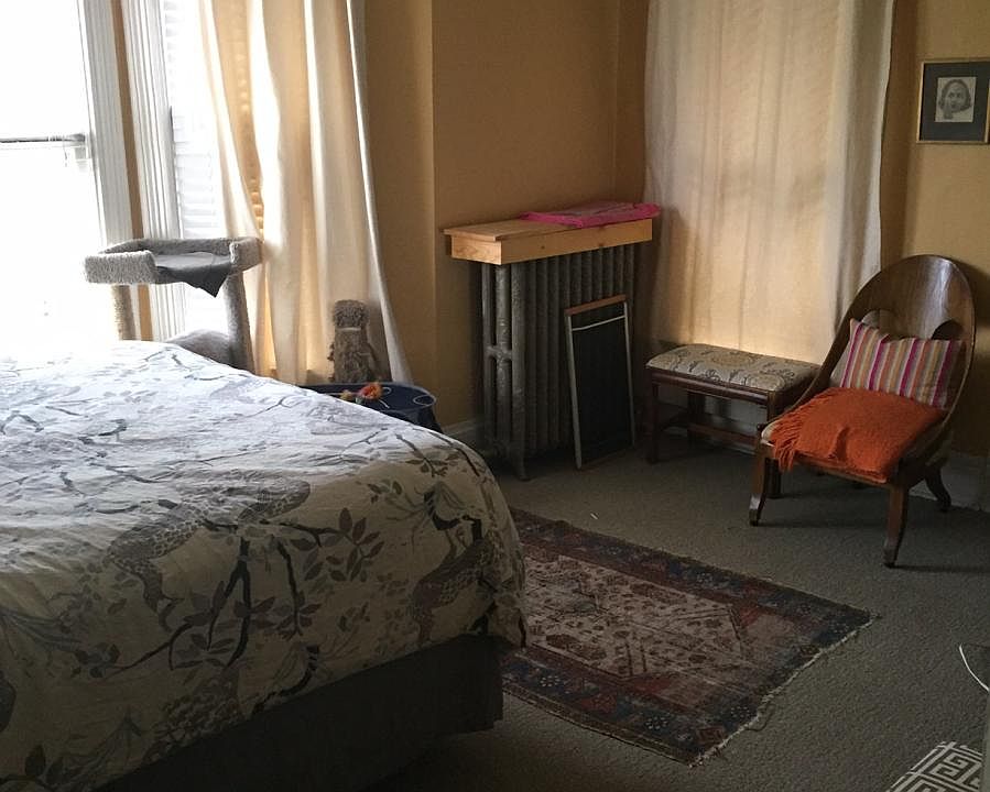 Large bedroom with bay windows