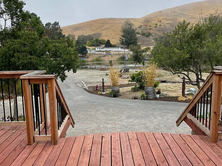 up to huge front deck looks out on our pond.