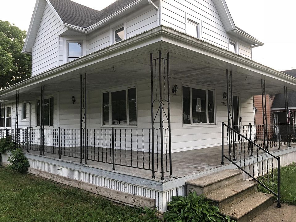 Front view with large porch