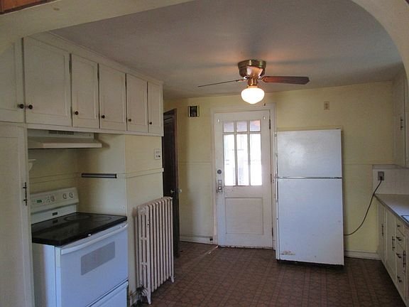This is the large kitchen that needs to be undated. Nice windows for lots of light.