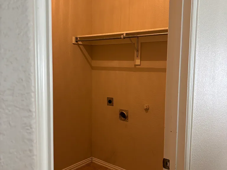 Laundry Room with Hook ups for Washer and Dryer (not provided). Door to garage is in Laundry Room