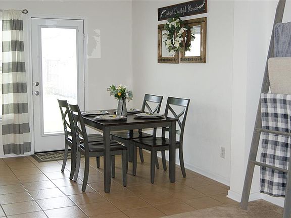 Dining area open to kitchen and living area