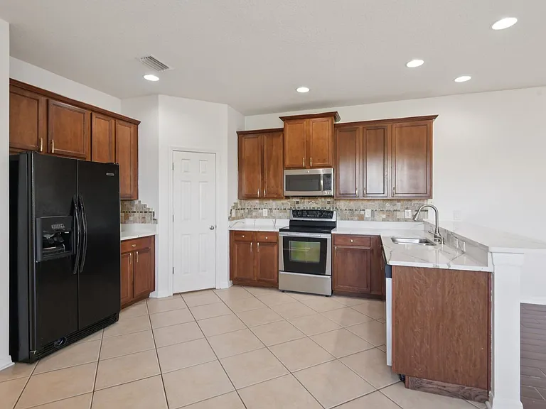12805 Avelar Manor Pl — Photo 11