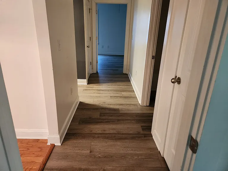 Hall off of LR with access to Kitchen and Bedrooms