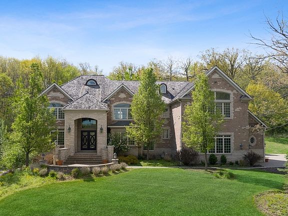 Luxurious home on approx 9 acres with a pond, huge