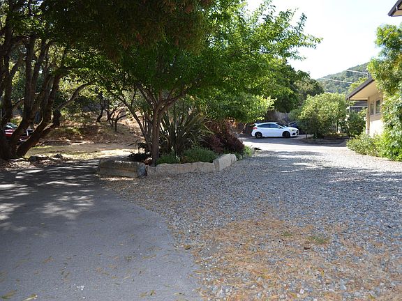 View of driveway beside house