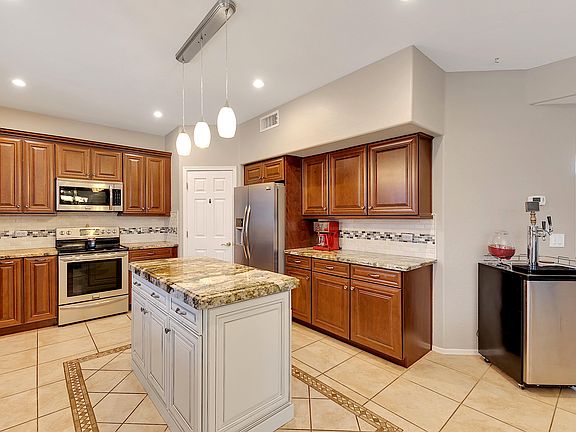 5th image of 9438 E Javelina Ave
