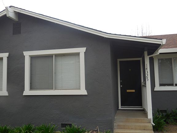 Entry way, living room on left, bedrooms on right