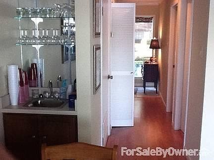 Wet bar and hallway