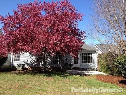 Back Yard
						:
						Back of House with Cherry Blossom