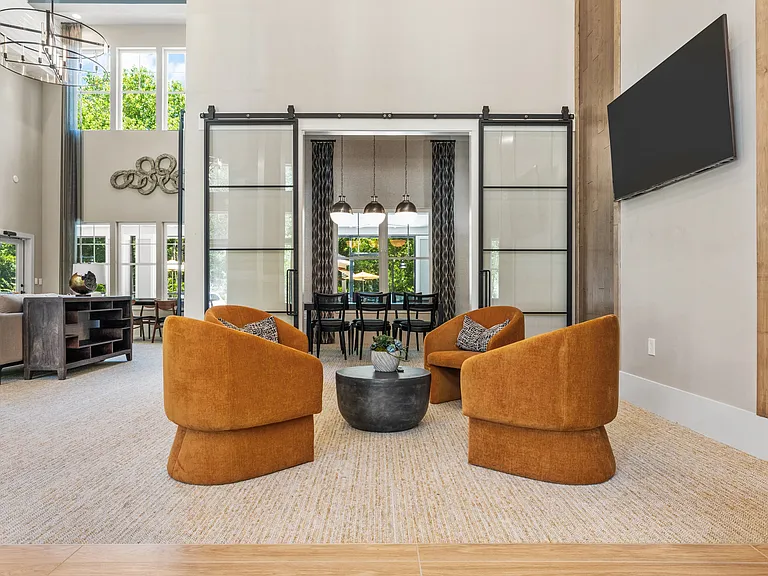 Langley Pointe Apartments | Clubhouse w/ Seating Area