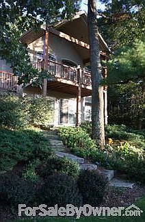 Landscape
						:
						Mature landscaping with large stone steps.