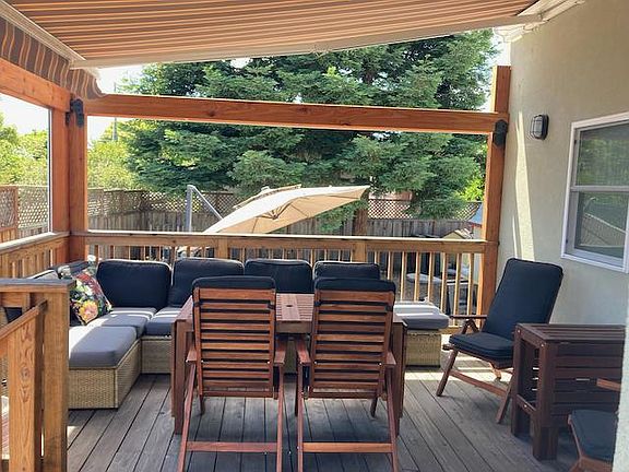 Deck with retractable awning. Deck is shared with owners.