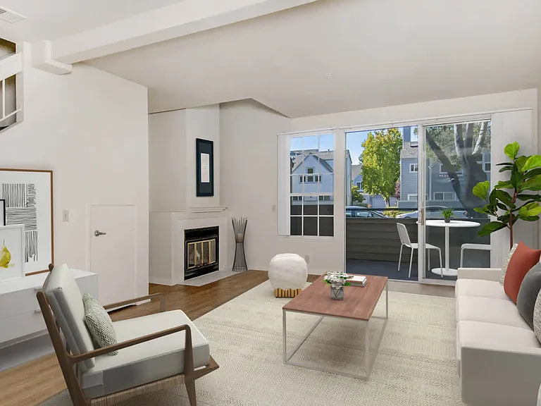 Living Area with Hard Surface Flooring, Fireplace and Patio