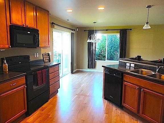 Hardwood floors in kitchen and dining area