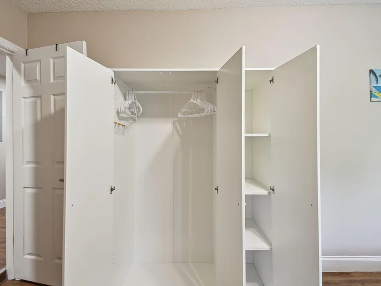 Armoire for hanging clothes and storage