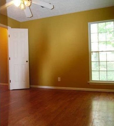 sunny bedrm w/wood floors