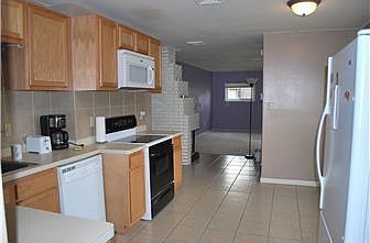 Kitchen with Modern Cabinets, Tile Floor