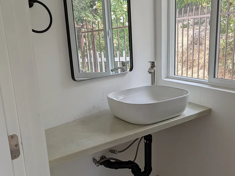 1/2 bath downstairs sink and toilet