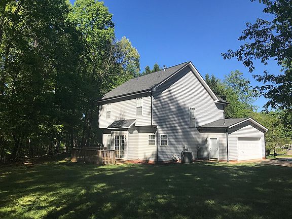 Garage and back of home. 