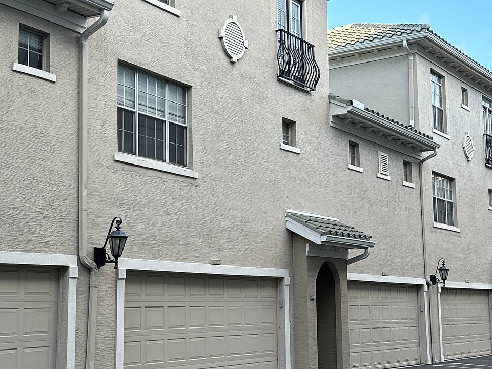 Three-story townhome with attached two car garage