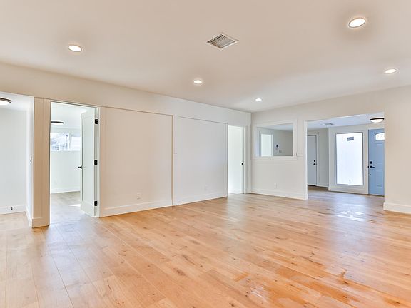 Hardwood floors throughout the house and guest house