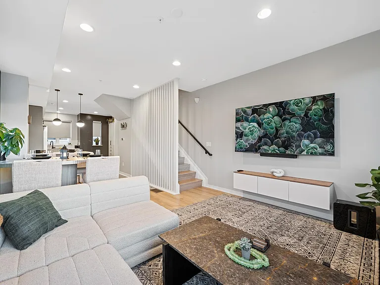 This couch is one of a kind and so comfortable. Relax in this spacious living room that has everything you need to make yourself right at home. Big screen smart TV with sound bar, cozy pillows, teddy blanket, views, and open access to the kitchen!