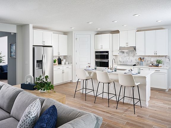 The Kitchen of the Jasmine Model at The Grove at Stuart Crossing.