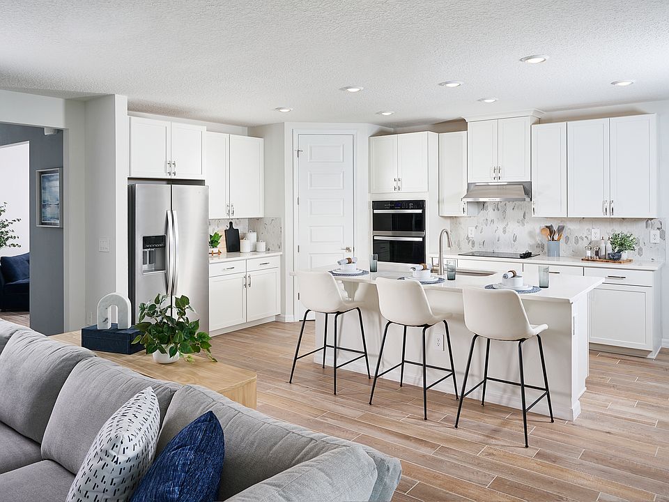 The Jasmine floorplan modeled at The Grove at Stuart Crossing.