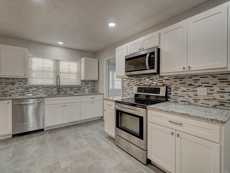 View from the entry to the kitchen from the living room.