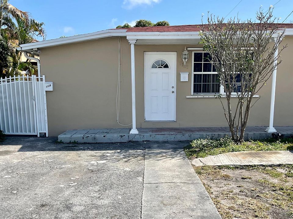 Front of house with parking