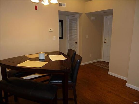 Entry opens to dining area, kitchen & living room, all vaulted!