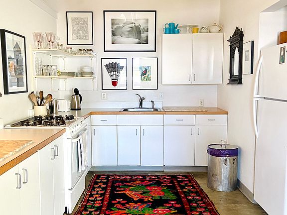 gas stove and fully equipped kitchen