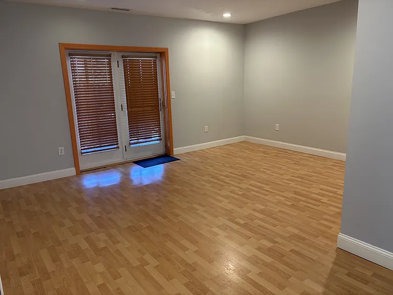 Entrance into patio, living room space
