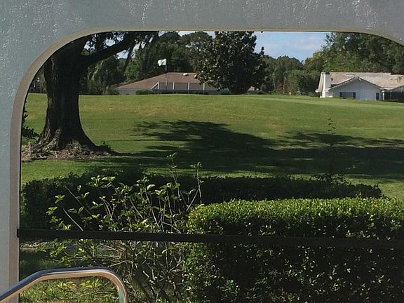 view of the 5th green from the pool