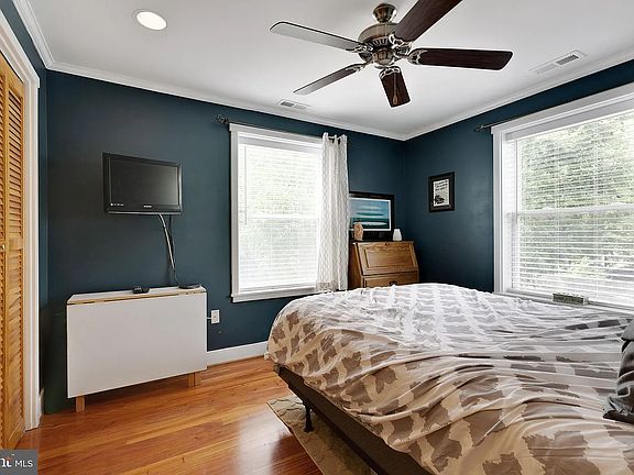 Primary bedroom. Windows face south and west. Generous reach in closet