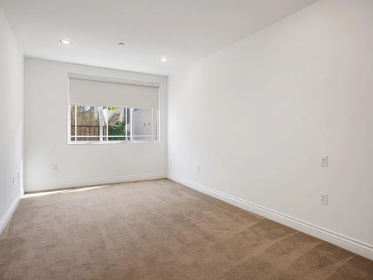 Bedroom with Recessed Lighting and Large-Size Windows