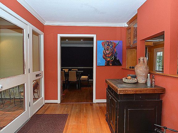 The foyer is open to the other parts of the home and is filled with natural light.