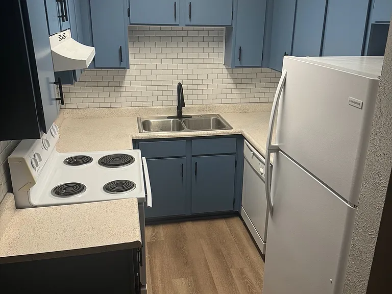 Renovated kitchens in modern color-schemes feature new tile backsplashes, resurfaced counters, and updated appliance packages.