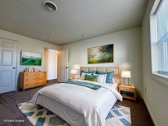 Virtually Staged First Bedroom in a 2 bed, 1 Bath Unit